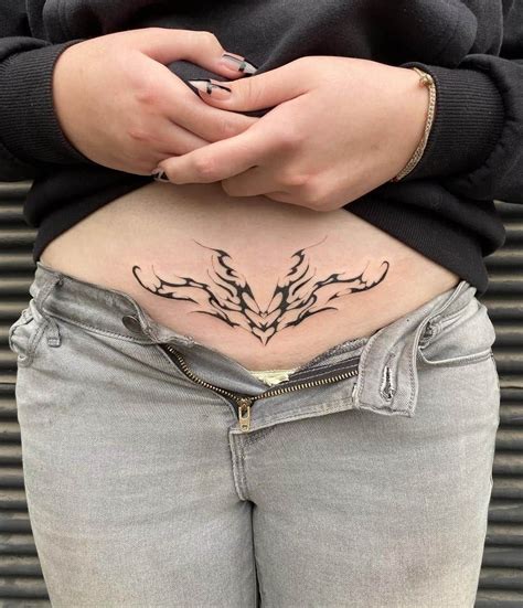 Womb Tattoo Ideas In 2021 – Meanings, Designs, And More | Tattoos, Pretty tattoos, Tramp stamp ...