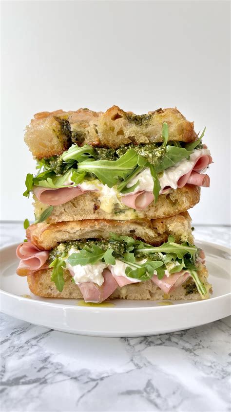 MORTADELLA, PESTO, BURRATA FOCACCIA SANDWICH WITH GARLIC CONFIT AIOLI — Desert Island Dishes