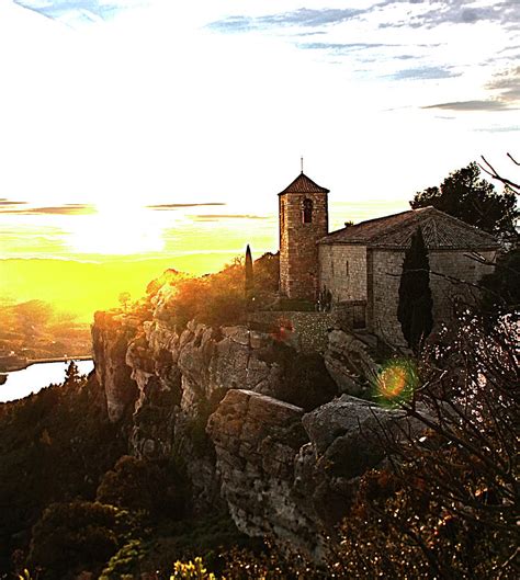 Spanish church with a river in the sunset Photograph by Robert Friedrich | Fine Art America