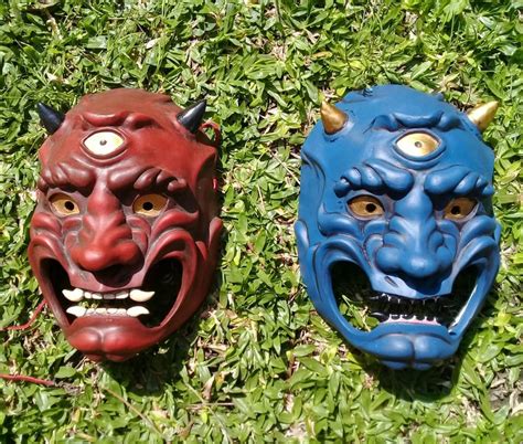 Original demon mask that I made (left) and the first of many copies by it's side. : Masks