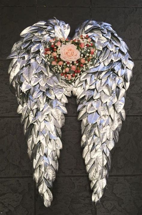 angel wings flower arrangement - Stan Killian