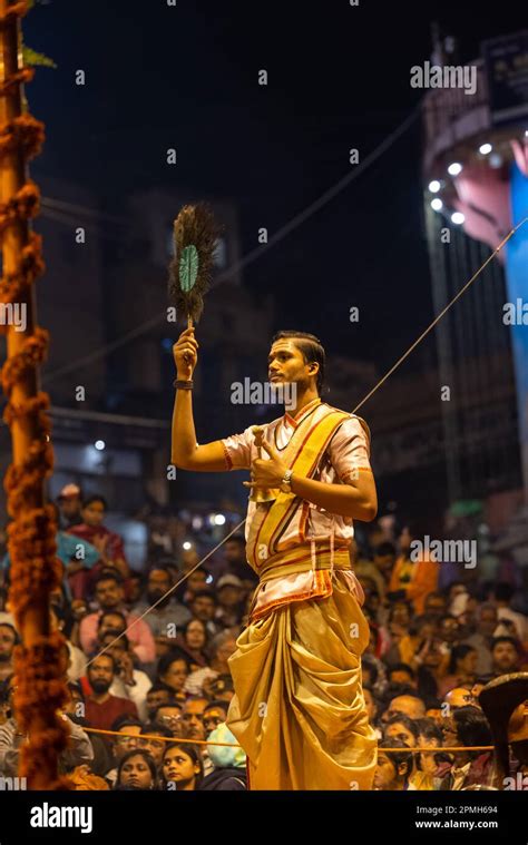 Ganga aarti, Portrait of an young priest performing river ganges ...