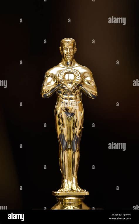 A golden Oscar replica trophy Stock Photo - Alamy