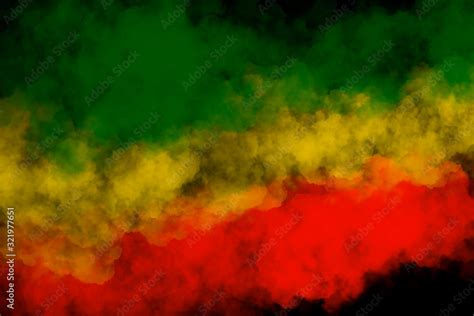 Green yellow red smoke on black background ,reggae background concept ...