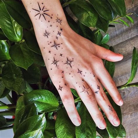 30+ Stunning Star Tattoo Design Ideas for Stellar Body Art | Hand tattoos, Small hand tattoos ...