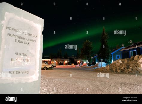 Northern lights over cabins at the Ice hotel in Jukkasjärvi, Sweden ...