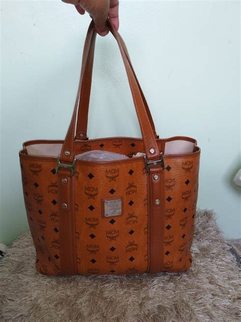 Authentic mcm cognac tote, Luxury, Bags & Wallets on Carousell