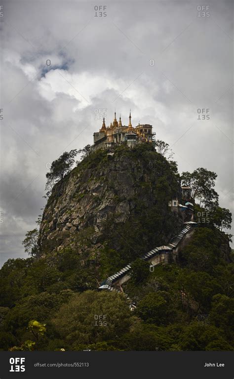 Mount Popa Volcano in Myanmar stock photo - OFFSET