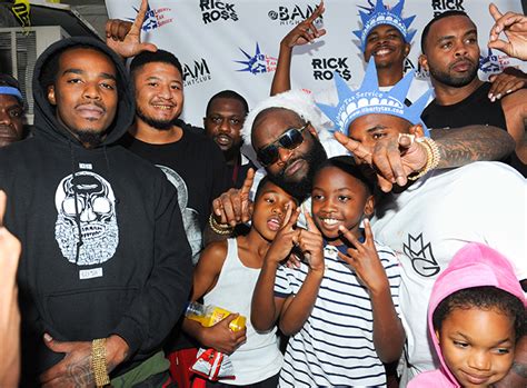 Like a Bawse! Rick Ross gives back to kids at 8th annual toy giveaway