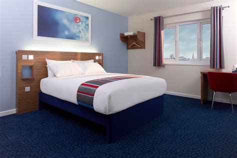 Travelodge hotel opening across from Glasgow's Queen Elizabeth University Hospital with car park ...