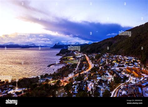 Molde, Norway. Aerial view of residential area in Molde, Norway at night. Beautiful fjord with ...