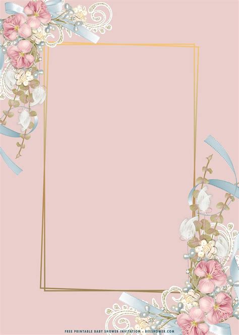 a pink and gold frame with flowers on the bottom, along with blue ribbon around it