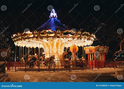 Bright Merry-go-round at Night in Winter Stock Photo - Image of carousel, equipment: 51438026