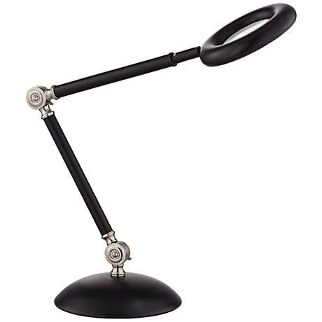 This LED magnifier desk lamp is adjustable allowing you to position the light where you need it ...