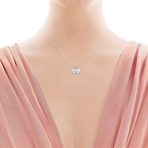 Return to Tiffany®:Mini Double Heart Tag Pendant_model-shot-1 | Pendant ...