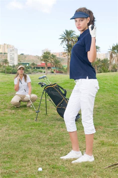 Pair of Golf Players in the Course of a Match Stock Image - Image of ...