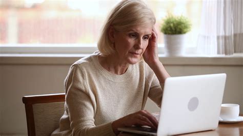 Serious Elderly Woman Typing On Computer Stock Footage SBV-338184311 ...