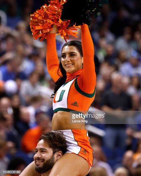 Miami Hurricanes Cheerleaders Photos and Premium High Res Pictures ...