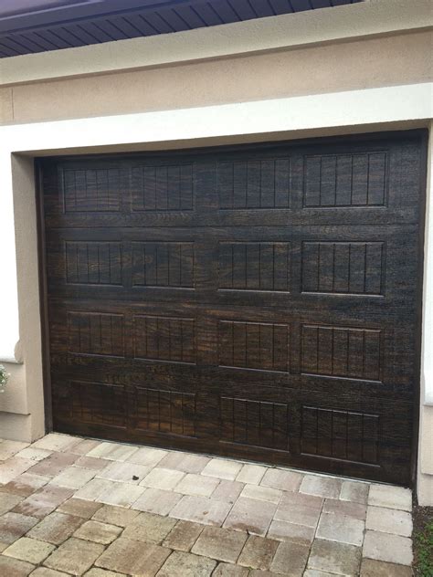 Faux wood garage doors by Holly Blanton Art | Wood garage doors, Faux wood garage doors, Garage ...