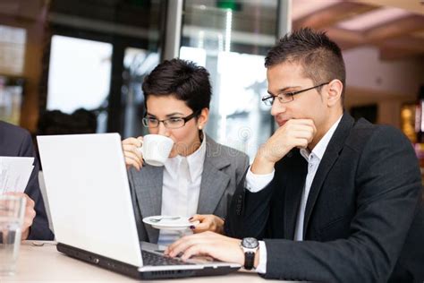 Business People Using Laptop Stock Image - Image of confident, discussion: 30948443