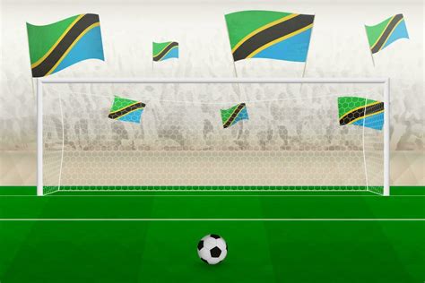 Tanzania football team fans with flags of Tanzania cheering on stadium ...