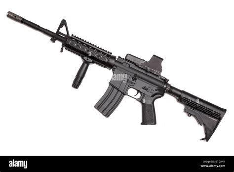 Weapon series. US Army M4A1 Carbine with tactical grip and holographic sight. Object isolated on ...