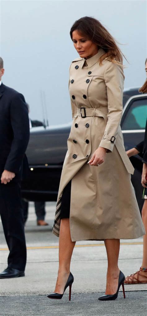 Melania Trump’s Burberry Coat in Belgium Battles the Windy Day ...