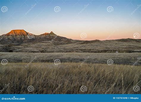 Alpenglow on Badlands Mountain Cliffs in Eastern Montana during Stock Photo - Image of high ...