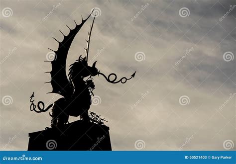 Welsh Dragon Statue in Silhouette, Against a Wintry Sky Stock Image ...