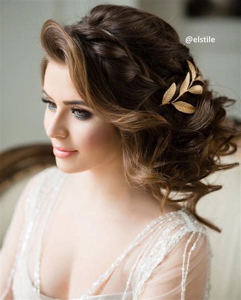 Beautiful messy updo wedding hairstyle for romantic brides