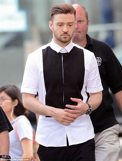 Justin Timberlake shows off his dance steps in monochrome outfit on set ...