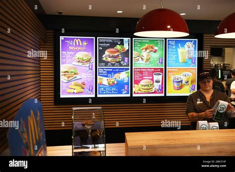 Colourful menu boards inside a McDonalds restaurant int he UK Stock Photo - Alamy