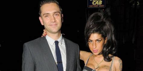 Amy Winehouse and Reg Traviss - Dating, Gossip, News, Photos