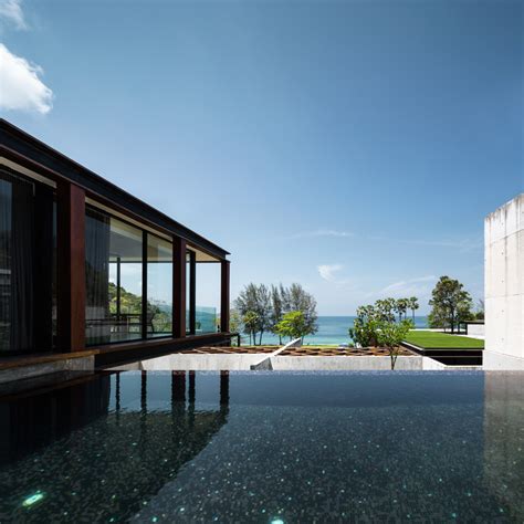 matchbox villas protrude from thai mountainside at naka phuket resort