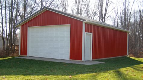 Small red and white storage barn from Pole Barns Direct | Building a pole barn, Pole barn garage ...