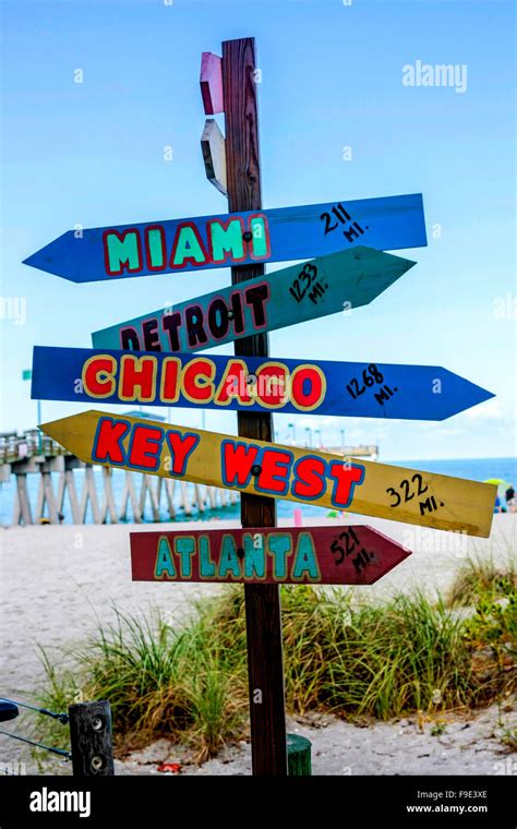 Multiple destination signs and distance from Venice in Florida Stock Photo - Alamy