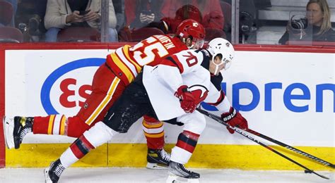 Sutter benches underperforming Flames players in OT loss to Devils