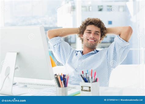 Casual Young Man with Computer in a Bright Office Stock Photo - Image of looking, length: 37395014