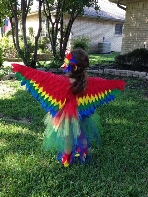 Diy parrot wings. | Parrot costume, Halloween costume contest, Bird costume