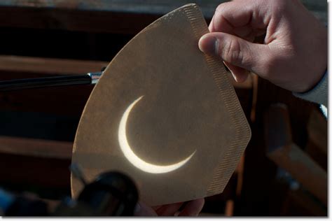 Photo: the solar eclipse through a pinhole camera | Richmond District Blog