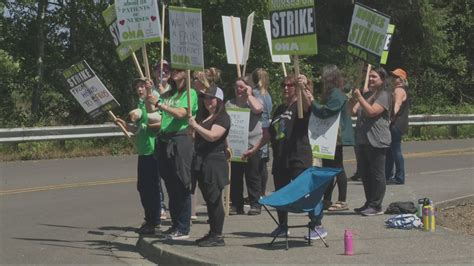 Nurses picket outside Providence Seaside on third day of strike | kgw.com