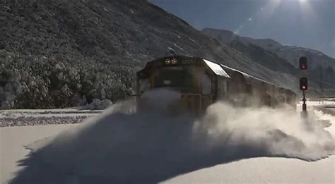 Amazing Video of Train Plowing Through Tracks Covered with Snow