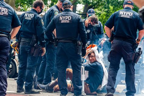 Climate activists cuffed at Downtown protest over Public Renewables Act ...