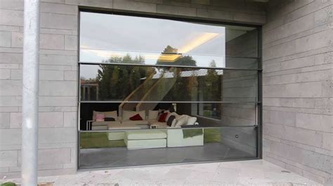 Vitrocsa Australia Cavity Guillotine Door | Glass wall systems, Glass ...