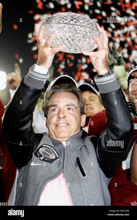 Alabama head Coach Nick Saban hoists the National Championship Trophy ...