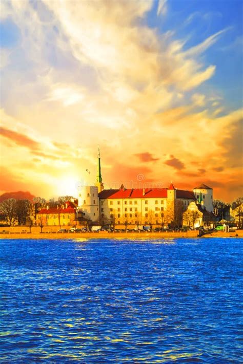 A Beautiful View of the Riga Castle on the Banks of the River Daugava ...