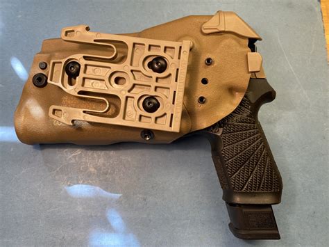 Sidearms & Scatterguns - M17 holster with light? | Sniper's Hide Forum