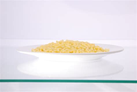 Pasta In The Shape Of A Cylinder Stock Image - Image of meal, delicious ...