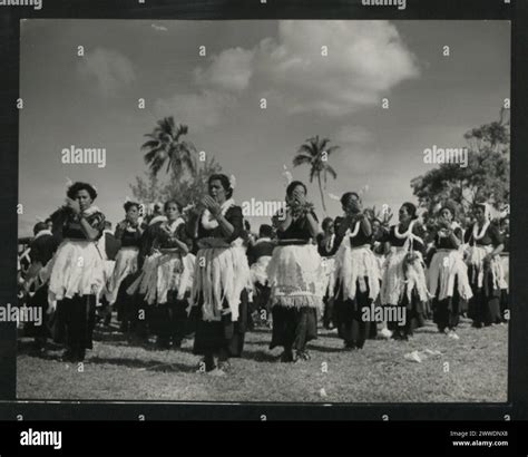 Description: Tongan women in an expressive dance. Location: Tonga tonga ...