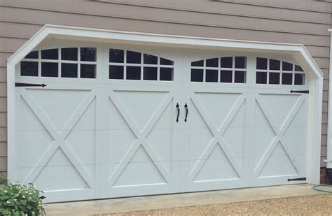 16x7 Model 5634A Carriage style overlay garage door with Arched Stockton top glass installed by ...